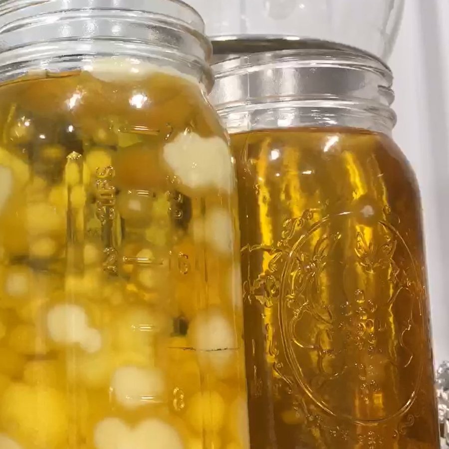 CBG distillate, amber and golden, ready for bottling